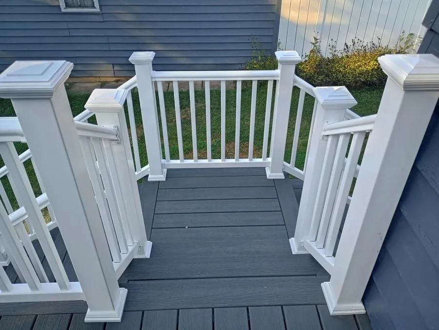 Deck landing with white railing detail